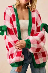 Checkered bow-tie sleeve knit Christmas cardigan by Tikibella™, featuring festive patterns and cozy knit design.