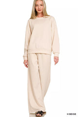 Zenana Tikibella™ scuba crewneck pullover and matching pants set in a cozy, relaxed fit with a smooth texture.