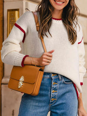 Tikibella™ contrast trim round neck sweater in soft fabric, showcasing a stylish design with a comfortable fit.