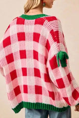 Checkered bow-tie sleeve knit Christmas cardigan by Tikibella™, featuring festive patterns and a cozy fit.