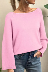 Solid color knit dolman sweater with loose bracelet sleeves by Tikibella™, displayed on a neutral background.