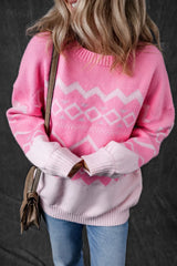 Geometric patterned long sleeve sweater by Tikibella™ featuring vibrant colors and a cozy knit design.