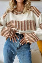 Tikibella™ striped knit long sleeve sweater displayed on a hanger with vibrant colors and a cozy texture.