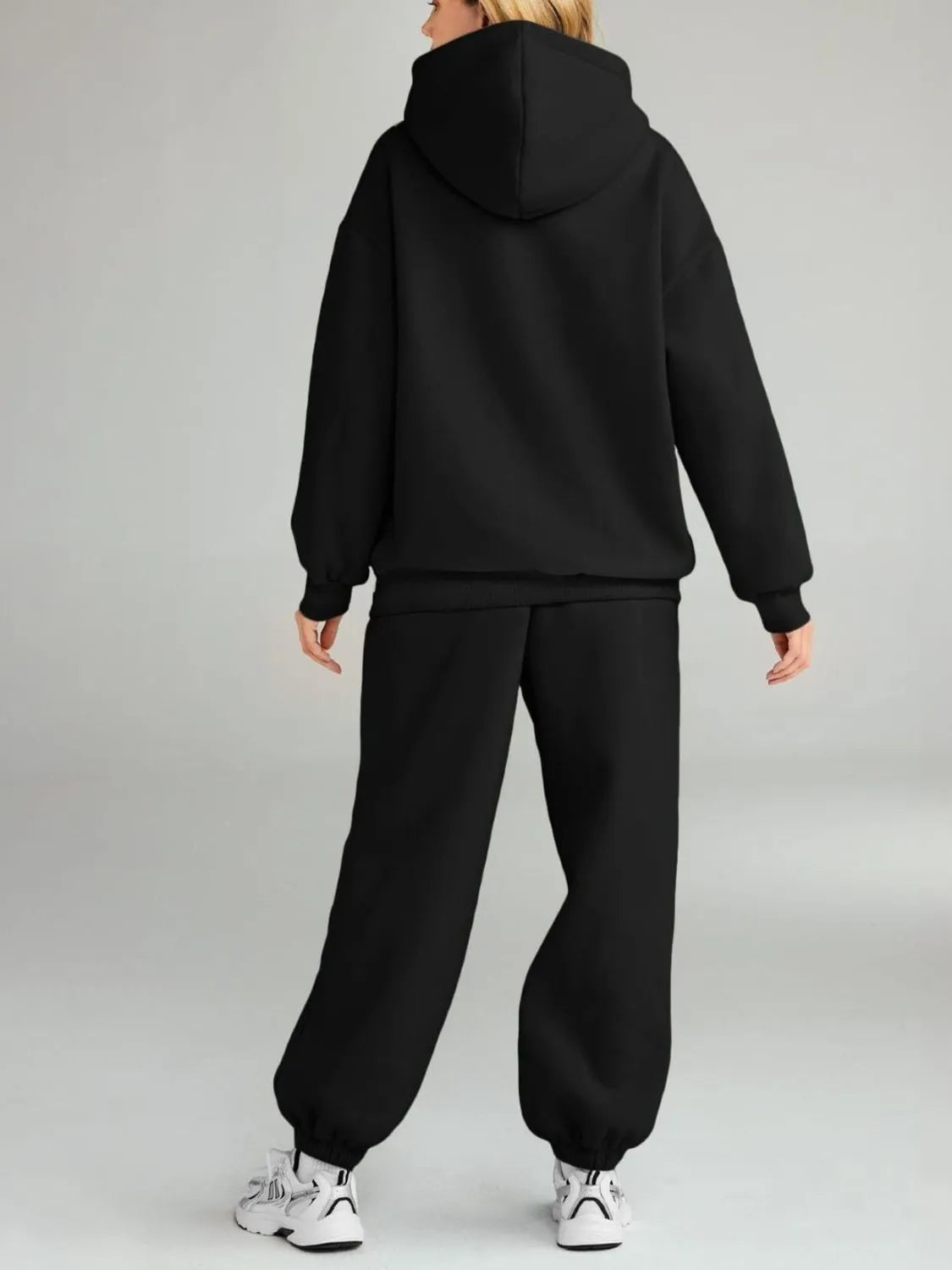 Plus size Tikibella™ hoodie and joggers set featuring a full-size kangaroo pocket in a cozy, casual look.
