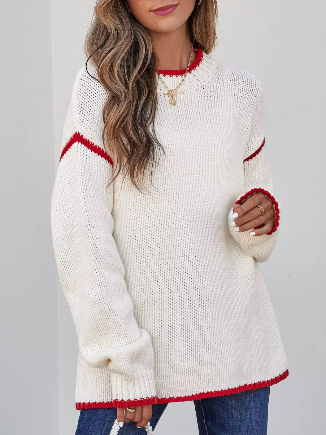 Tikibella™ contrast trim round neck sweater in soft fabric, showcasing vibrant trim details and a cozy fit.
