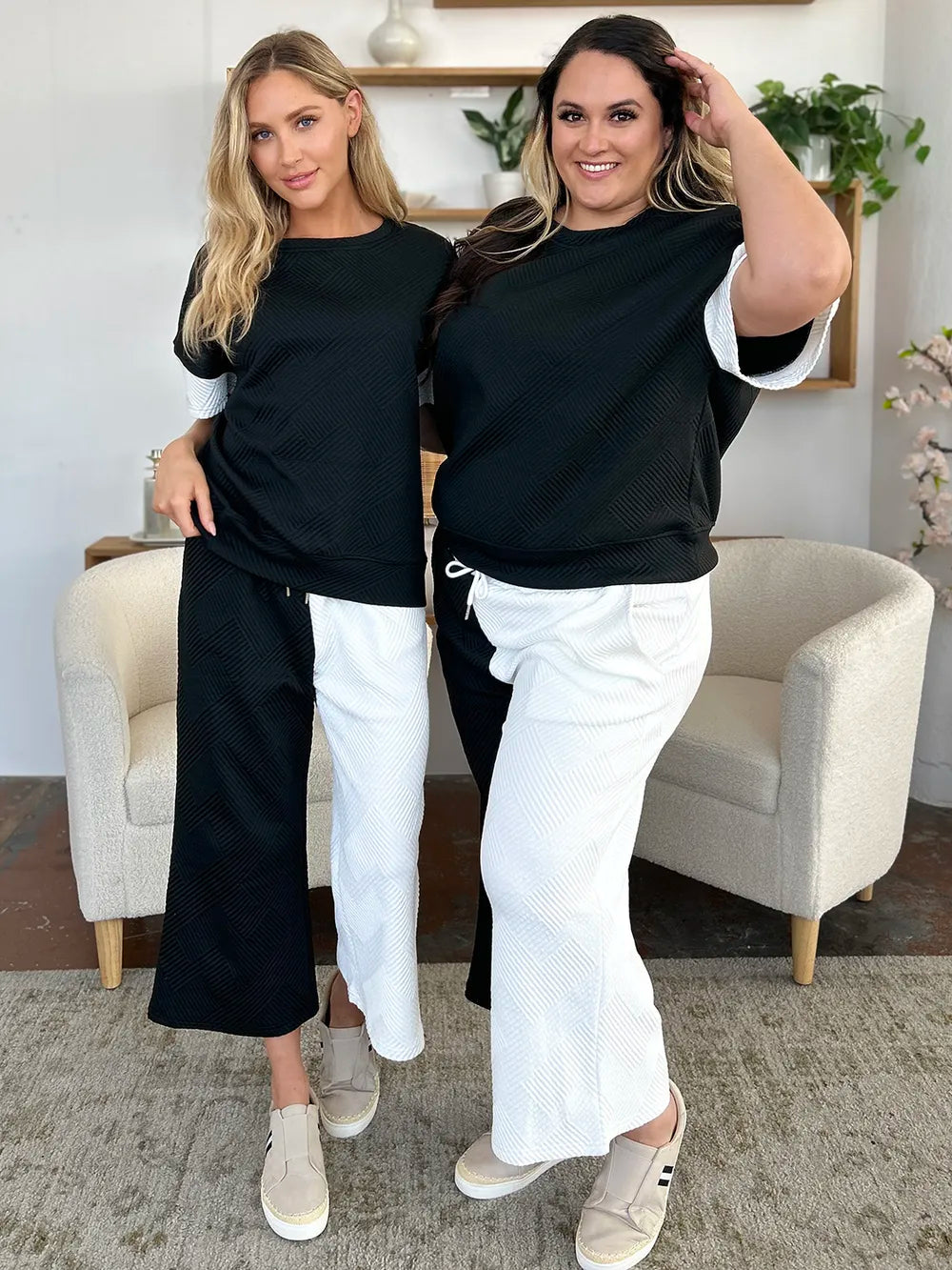 Tikibella™ Double Take Texture Contrast T-Shirt paired with Wide Leg Pants in a stylish outfit display.