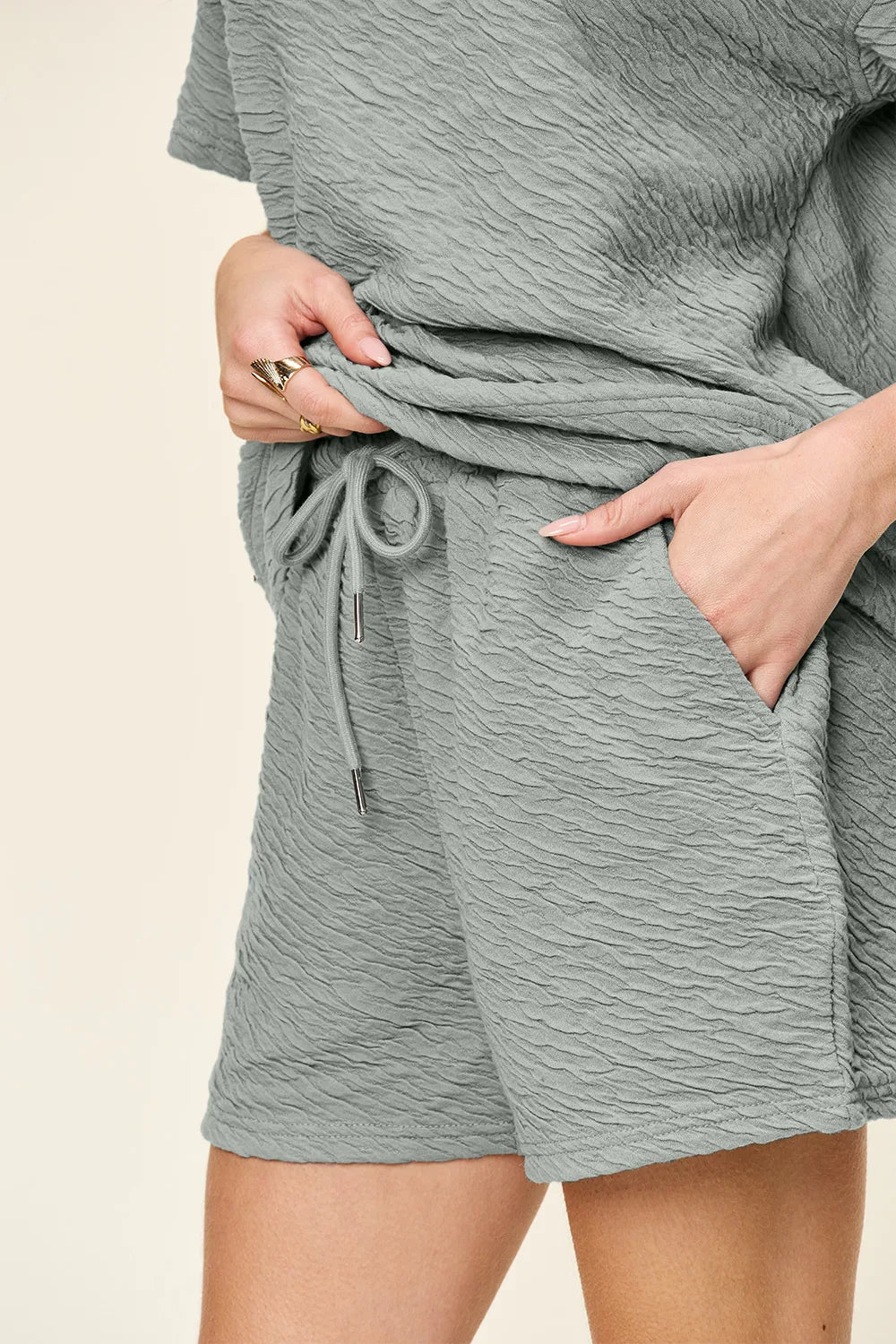 Double Take texture short sleeve t-shirt and drawstring shorts set by Tikibella™, featuring a casual, comfortable style.