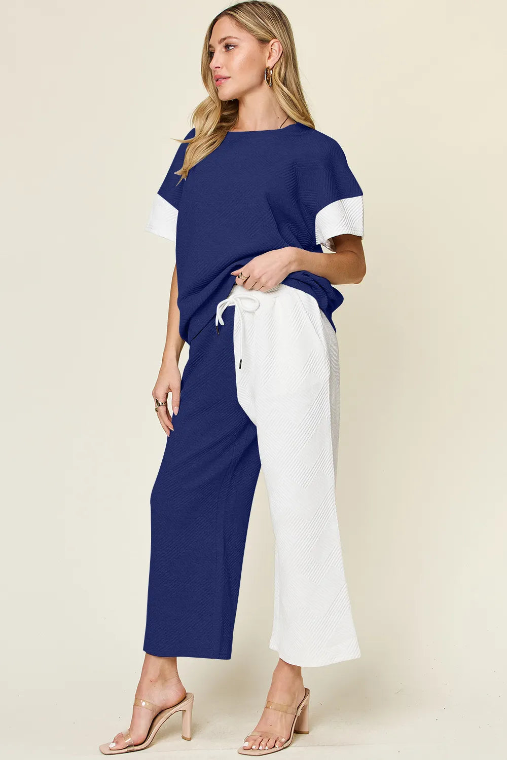 Double Take Tikibella™ texture contrast t-shirt paired with wide leg pants in a stylish outfit set.