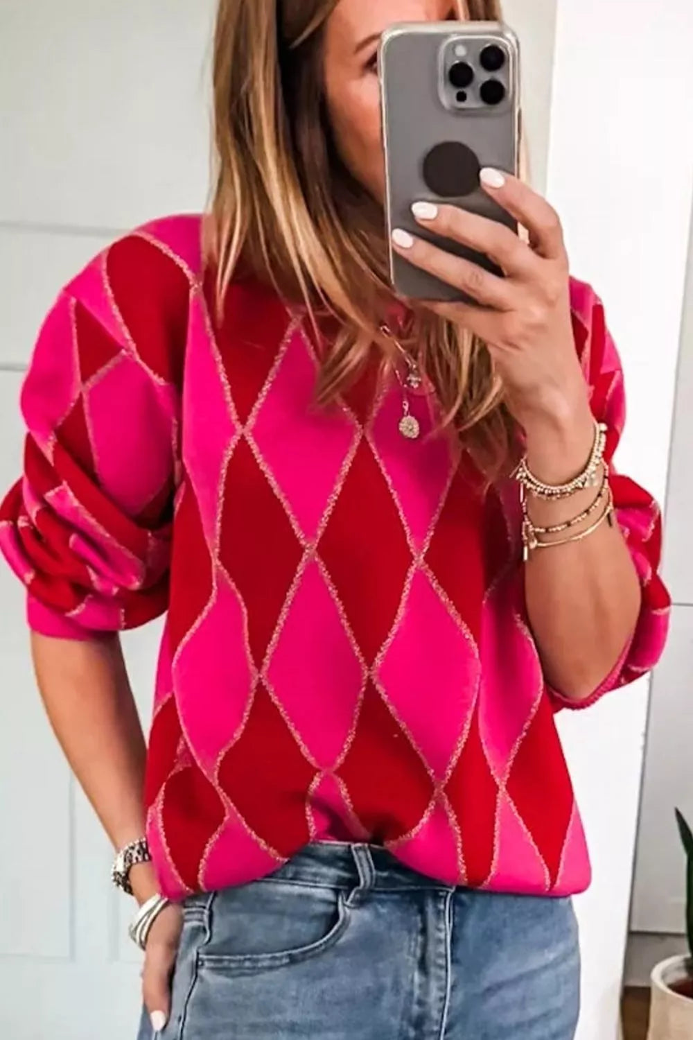 Tikibella™ argyle pattern long sleeve sweater in vibrant colors, featuring a cozy fit and stylish design.