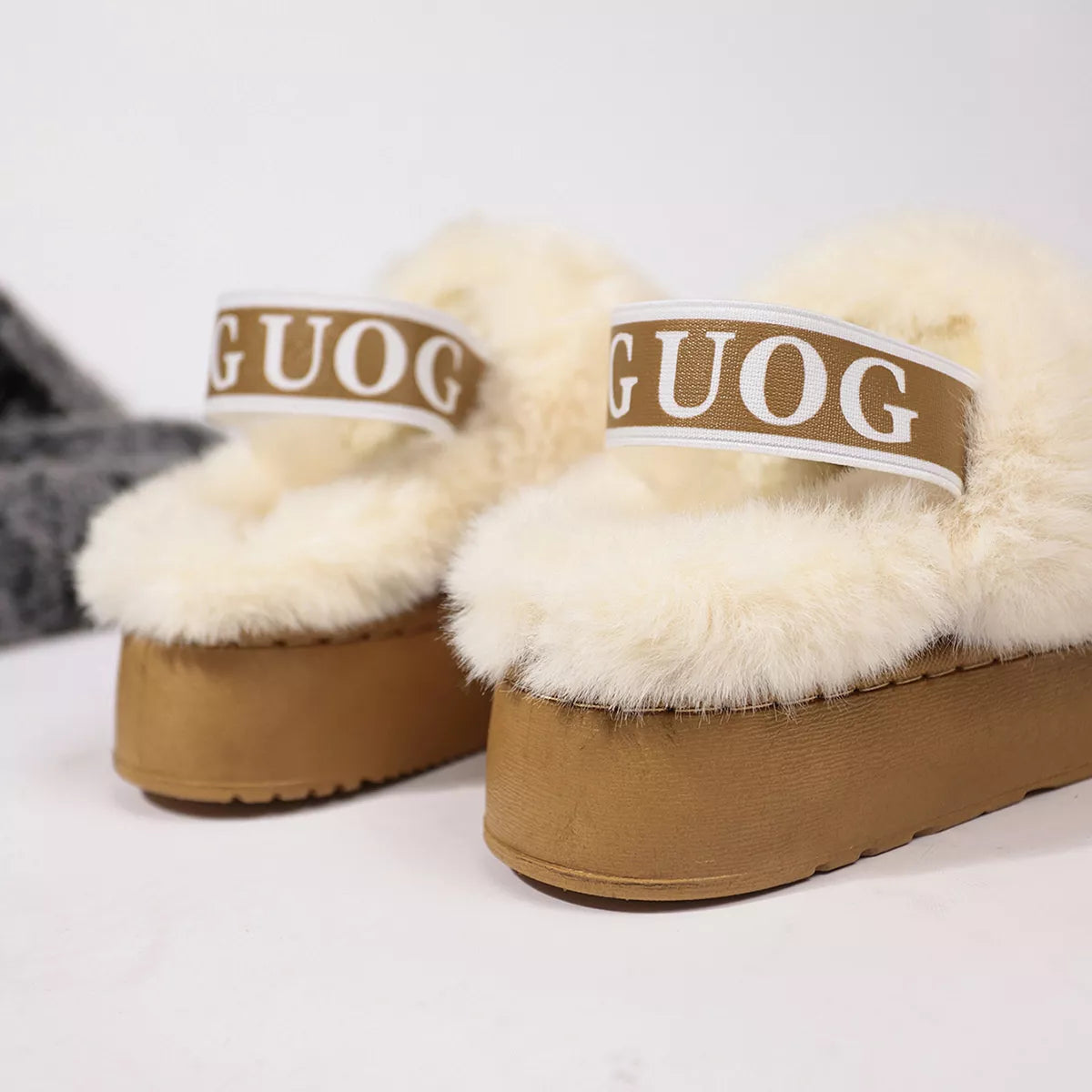 Round toe platform ankle boots by Tikibella™ in black with a chunky heel and textured upper, perfect for stylish outfits.