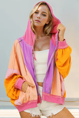 Double Take full size color block zip-up hoodie by Tikibella, featuring vibrant color panels and a cozy hood.