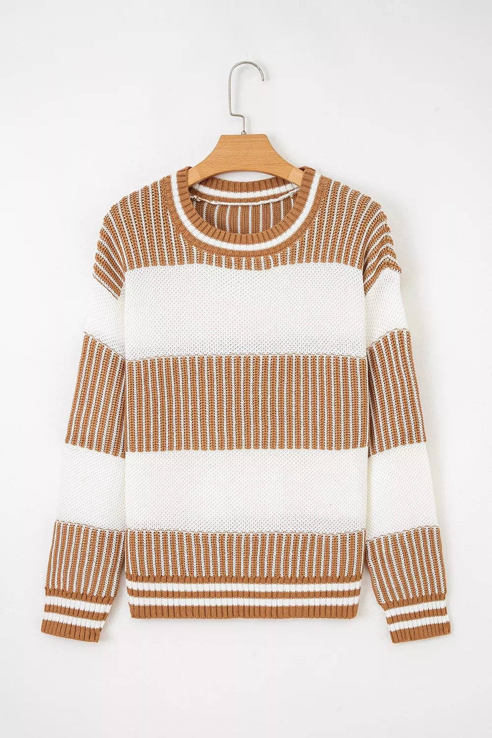 Tikibella™ striped knit long sleeve sweater featuring a cozy design and vibrant color pattern.