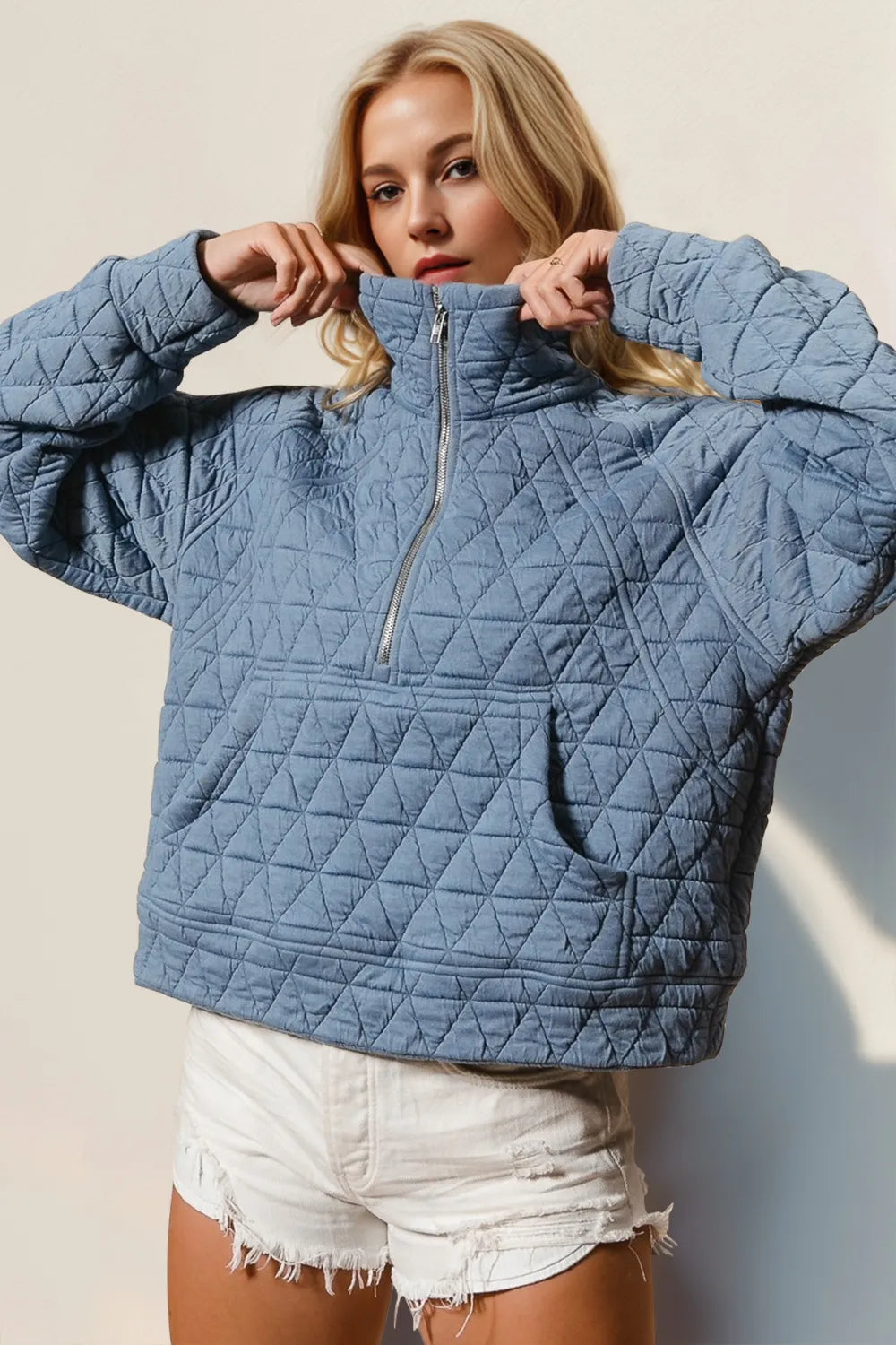 Tikibella™ Double Take half zip long sleeve quilted sweatshirt with pocket, in a cozy, stylish design.