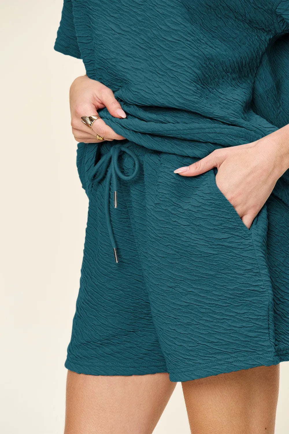 Tikibella™ double take short sleeve t-shirt and drawstring shorts set in casual style, showcasing fabric texture and fit.