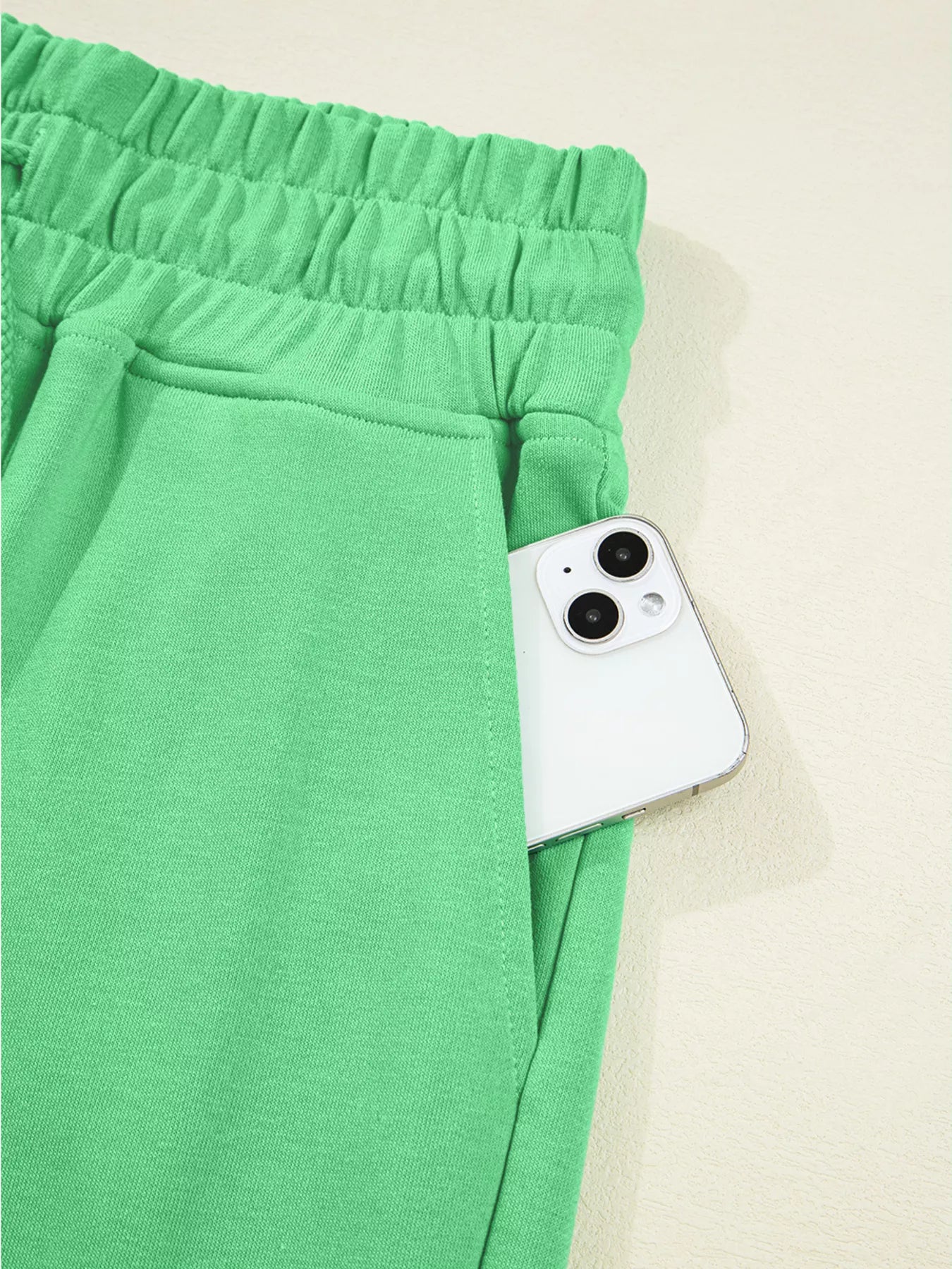 Drop shoulder puff sleeve crop top paired with drawstring wide leg pants in a stylish Tikibella™ set.