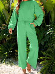 Tikibella™ drop shoulder puff sleeve crop top paired with drawstring wide leg pants in a stylish outfit set.