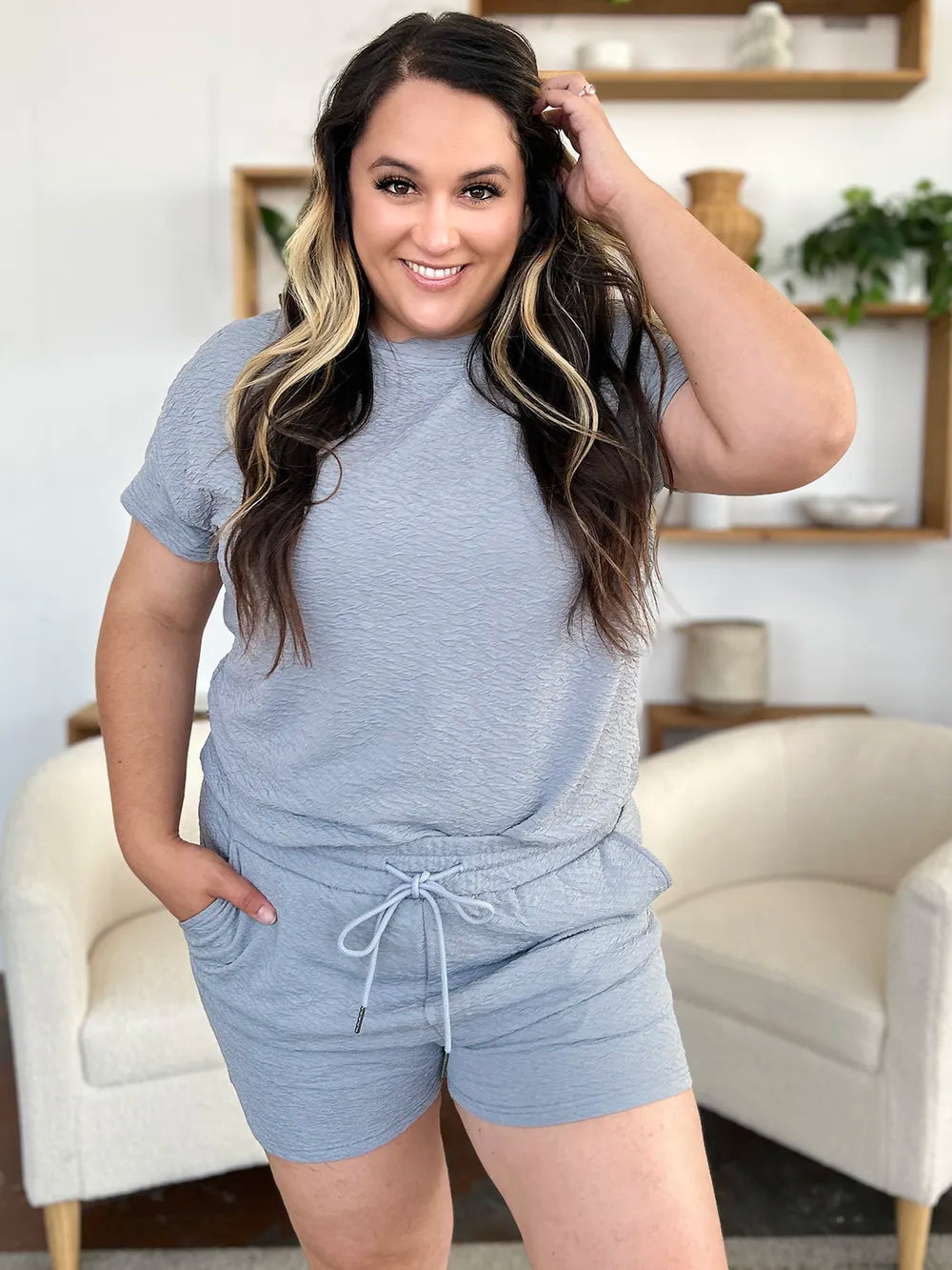 Double Take Tikibella™ short sleeve t-shirt and drawstring shorts set in a casual outfit display.