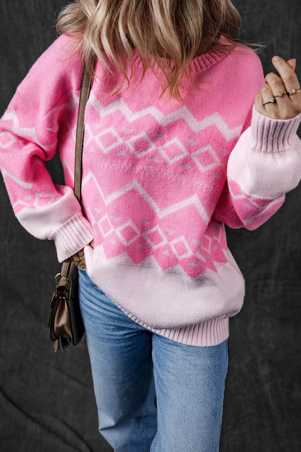 Tikibella™ geometric patterned long sleeve sweater in vibrant colors, showcasing a stylish design and cozy fit.