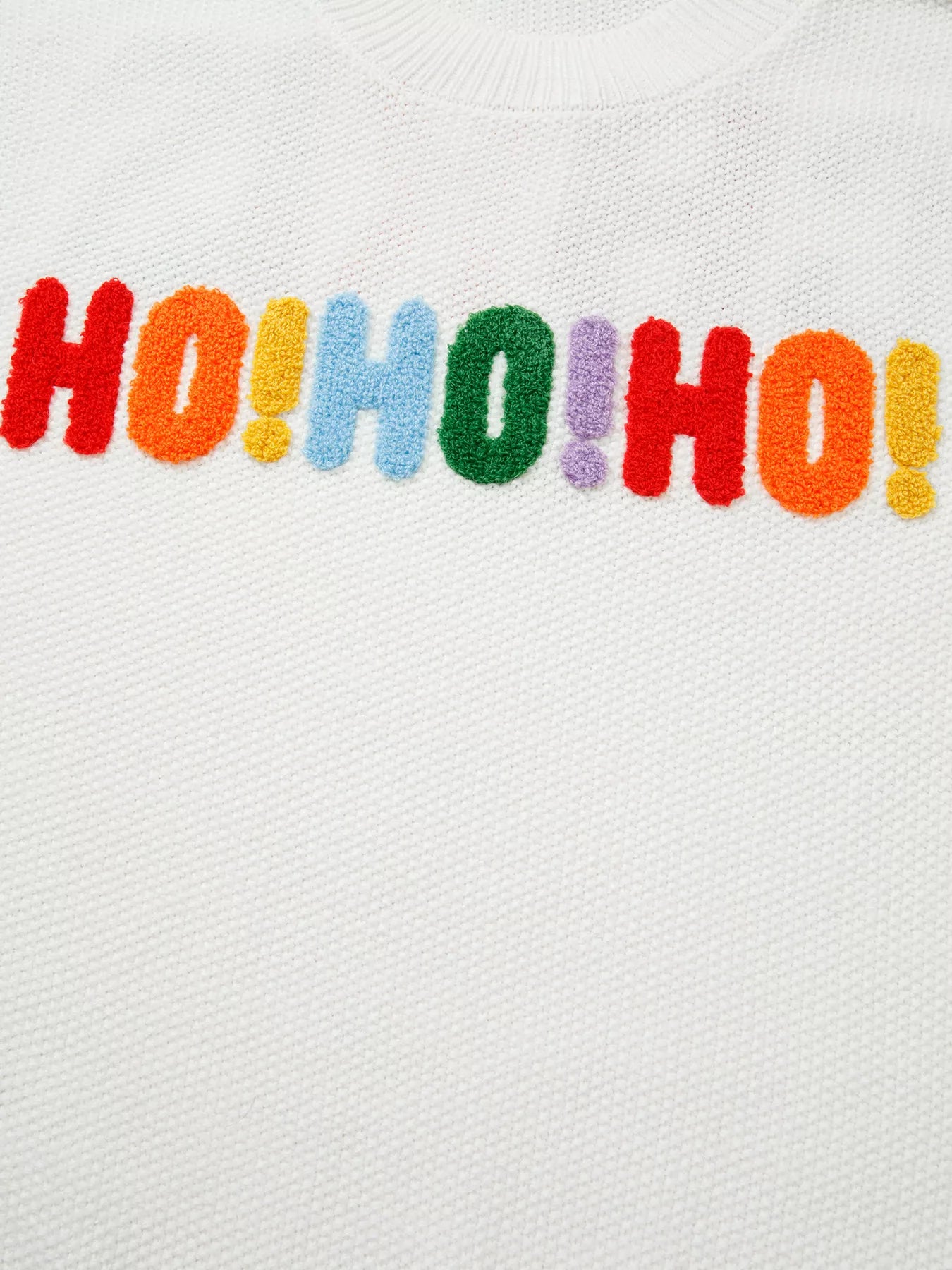 Tikibella™ HOHOHO MERRY CHRISTMAS drop shoulder holiday sweater in festive red with white lettering and relaxed fit.