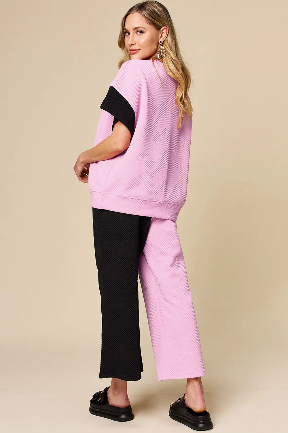 Tikibella™ Double Take full size texture contrast t-shirt and wide leg pants set in a stylish, relaxed fit.