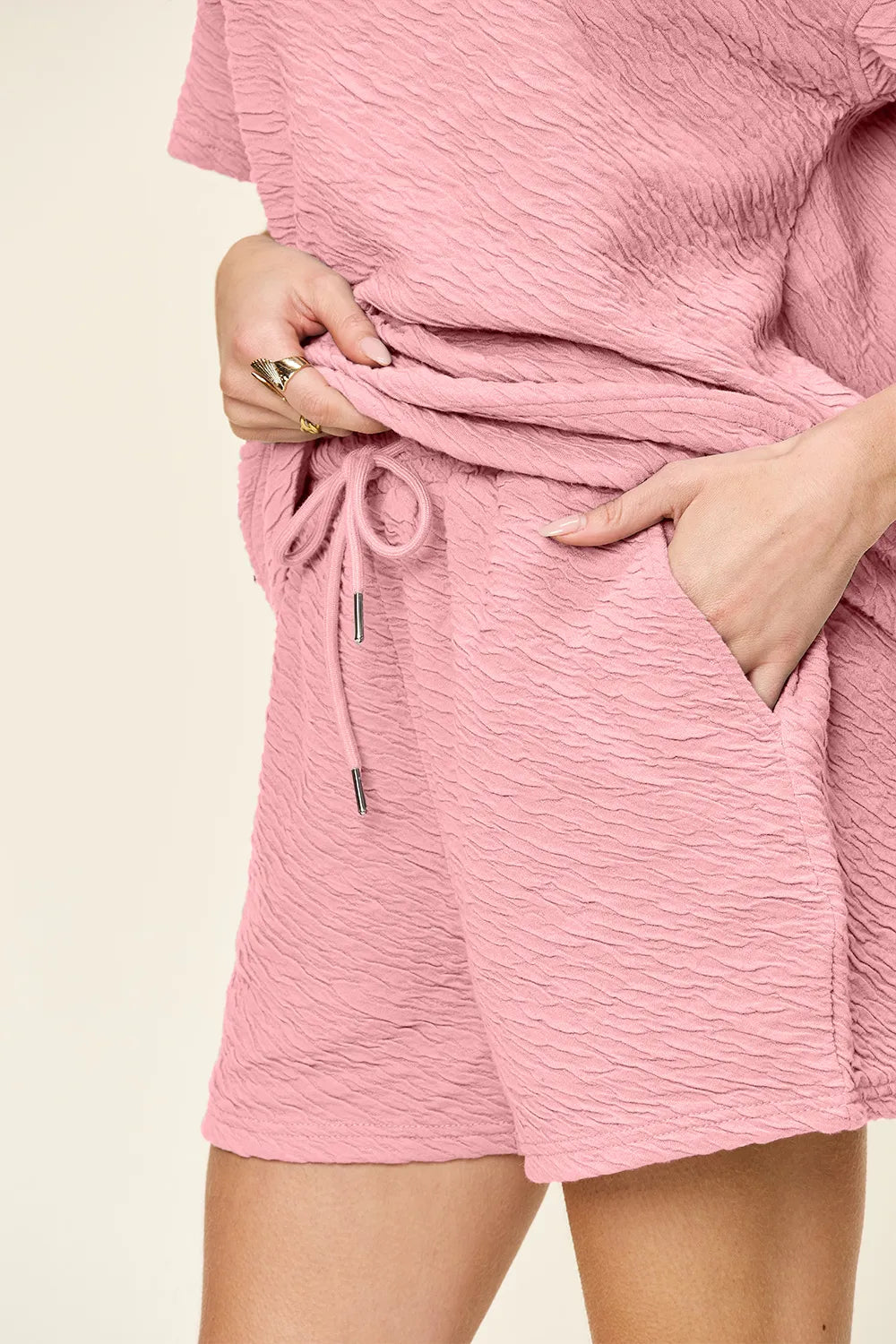 Tikibella™ double take texture short sleeve t-shirt and drawstring shorts set in casual wear displayed on a neutral background.