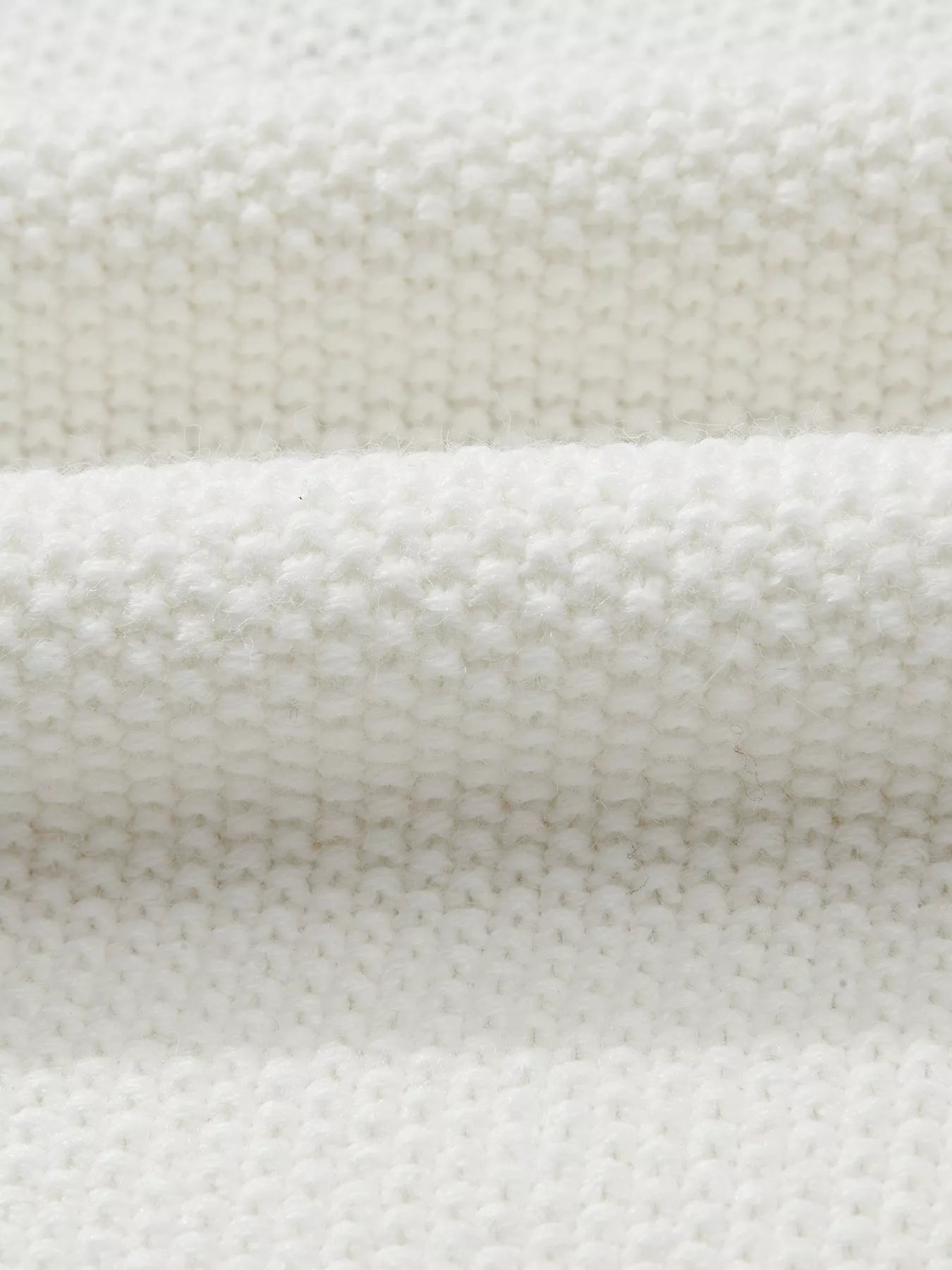 Tikibella™ HOHOHO MERRY CHRISTMAS drop shoulder holiday sweater in festive red with white lettering and relaxed fit.